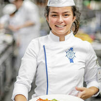 Students in the kitchen during Cuisine Diploma program at Le Cordon Bleu