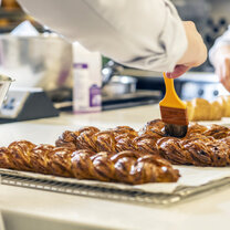 Students in the kitchen during Boulangerie program at Le Cordon Bleu