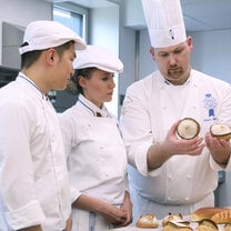 Students in the kitchen during Boulangerie program at Le Cordon Bleu