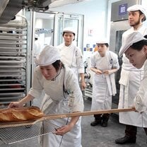 Students in the kitchen during Boulangerie program at Le Cordon Bleu