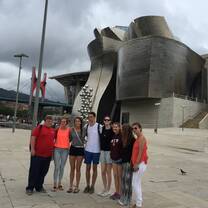Horizons Abroad summer Spanish immersion students smiling in front of the Guggenheim Museum in Bilbao, Spain