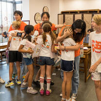 Campers hugging teachers