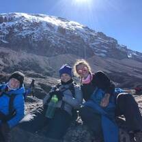 Women climbing Mt Kilimanjaro with Green Paw Adventures