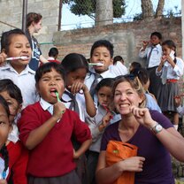 Projects Abroad volunteer teaches Nepali children proper tooth hygeine Projects Abroad volunteer teaches Nepali children proper tooth hygeine