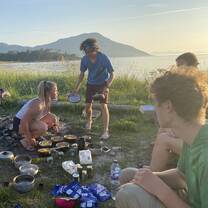 Volunteers preparing a healthy dinner
