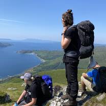 A volunteer enjoying the beautiful view over the Scottish Highlands