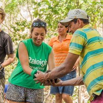 Volunteers and community members work together during the community project