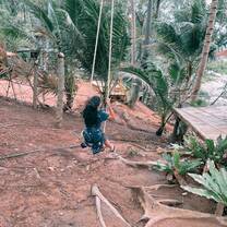 woman swinging on swing Premier TEFL internship
