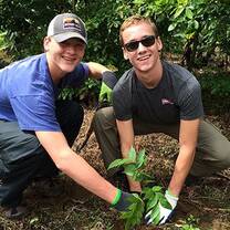 Men planting plants in Costa Rica