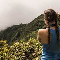 Girl taking photos of forest