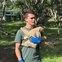 Student with sloth