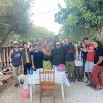 Group photo with their host