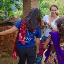 Sharing photos with young students 