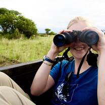 Student with binoculars looking at you