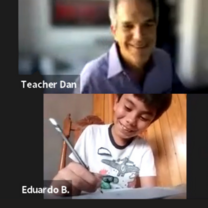 Male teacher with young boy in Zoom