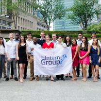 interns with The Intern Group flag