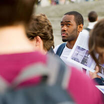 A student looks up thoughtfully