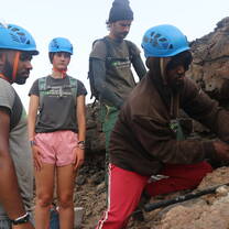 Volunteers and field techicians working on a red-billed-tropic-bird