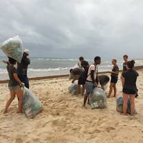 Volunteeers and staff beach clean-up