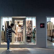 Students creating a display in the Visual Merchandising Lab at Accademia del Lusso Milan