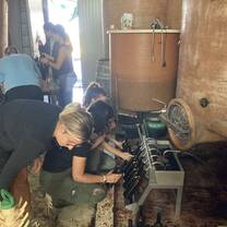 Students bottling wine