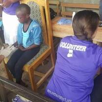 medical outreach in a school to dress wounds and to treat skin rush