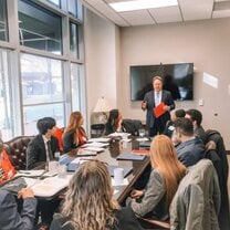 Students meeting w/ a firm