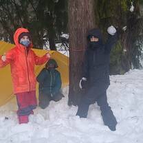 building a shelter in Outdoor Survival Skills class