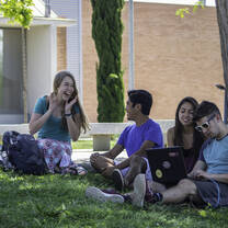 Students on campus behind the International Center