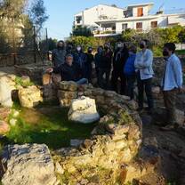 Students learning about Voula Excavation Site