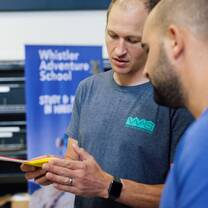 Student learning boot fitting skills