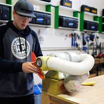 Student practicing boot fitting skills