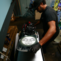 Finishing touches on a new snowboard
