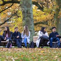 Students sitting on a bench