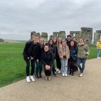 Group of students in front of Stonehenge 