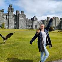 Posing next to bird in front of Castle