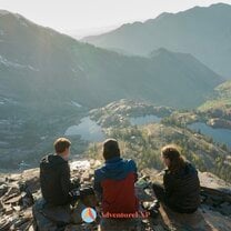 People with a mountain landscape