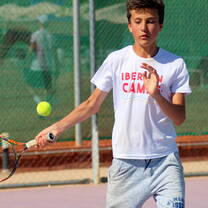 CAMPER PLAYING TENNIS AT IBERIAN CAMPS