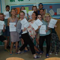 Group holding TEFL paper