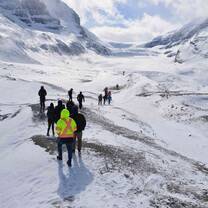 Youth hiking towards a glacier