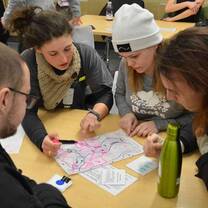 Youth working as a team to solve a problem