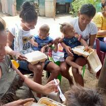 Teenage mother's with a meal