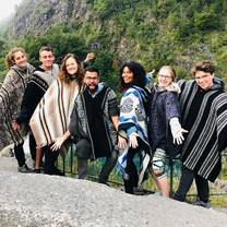 Students wear ponchos while exploring Chile.