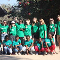 Volunteers and children group