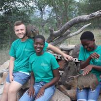 Volunteer, children and Dassie