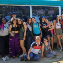 students group photo at the bus 
