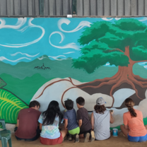 students painting mural 