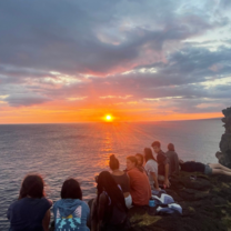 students watching sunsets 