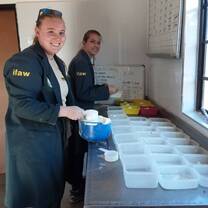 Preparing specialised milk bottles for the elephant calves
