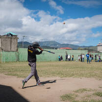 Students playing baseball